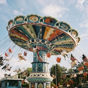 Enjoying the amusement park rides during the summer
